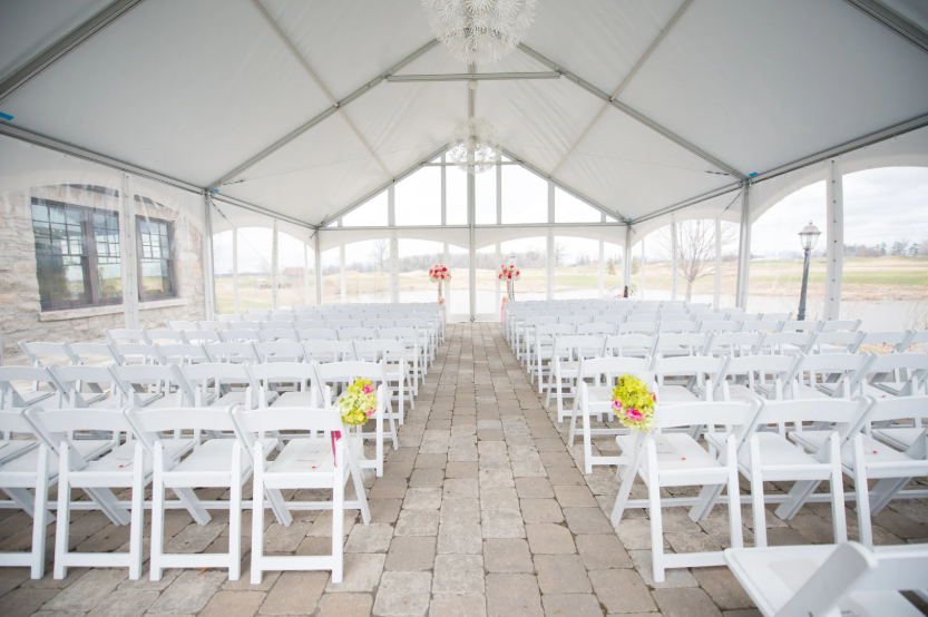 Chairs set up for wedding in event tent rental Toronto